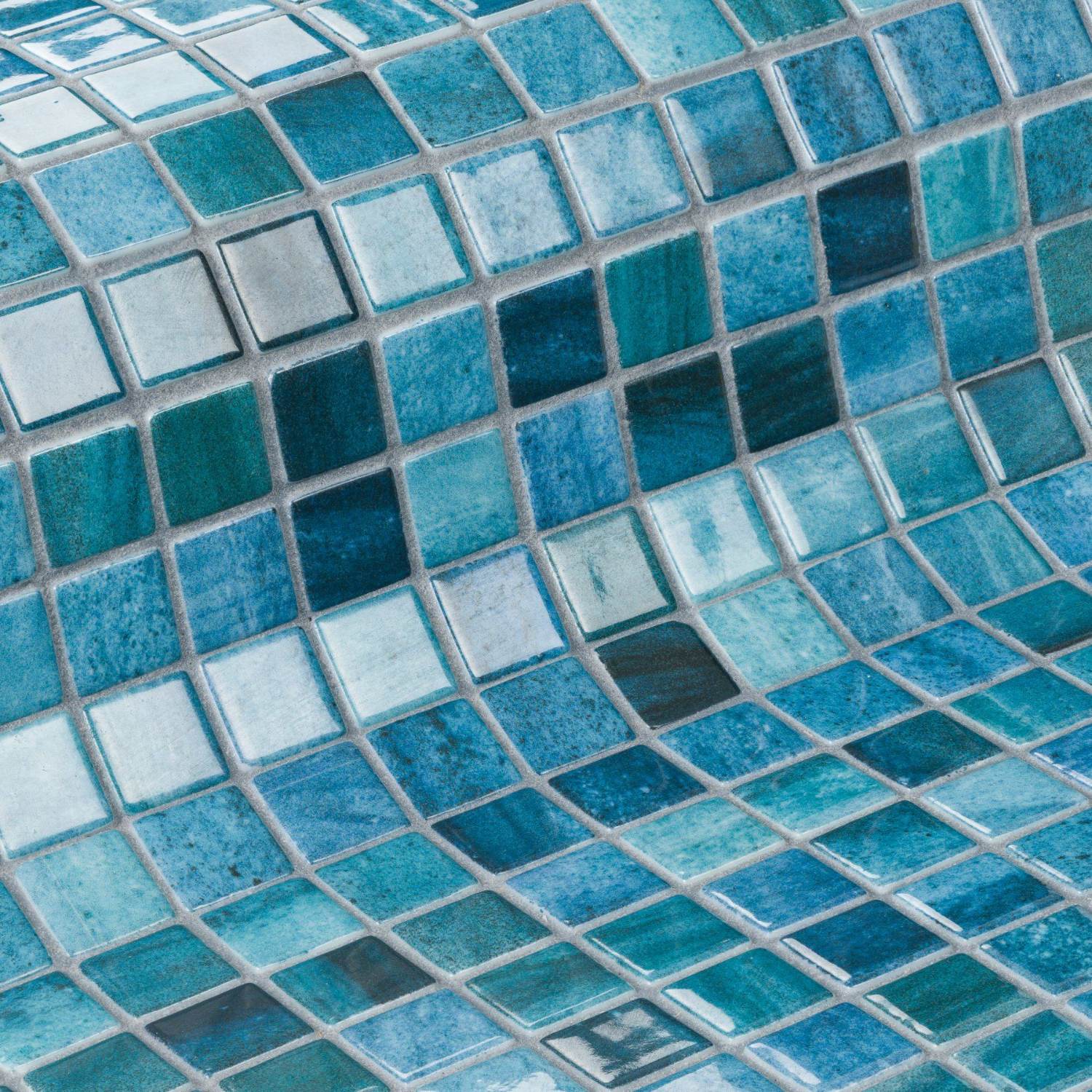 Fully tiled swimming pool finish with blue mosaic tiles